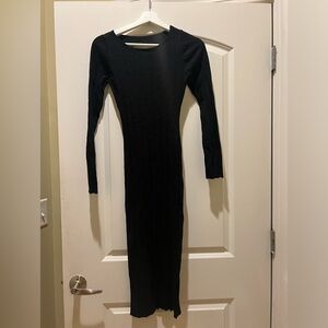 Black sweater, body conscious dress